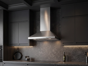 30 Inch 600 CFM Wall Mount Range Hood installed in a dark modern kitchen with stainless chimney