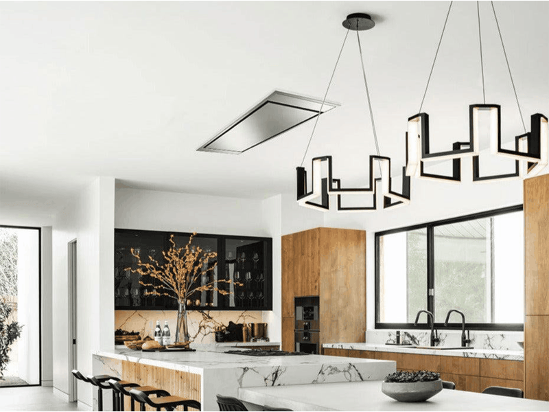 Victory Horizon ceiling range hood installed in a modern open-concept kitchen providing discreet 900 CFM Power