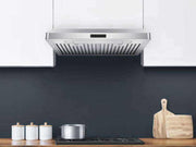 30 Inch 600 CFM Under Cabinet Range Hood installed between white modern cabinets above a gas cooktop, highlighting the slim profile of the Victory Luna