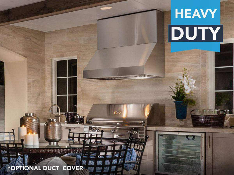 Professional outdoor kitchen setting featuring the Victory prestige hood installed with an OPTIONAL DUCT COVER in a tiled backsplash environment