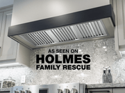 Installed Victory Q5 stainless steel range hood insert in a custom kitchen featured on Holmes Family Rescue