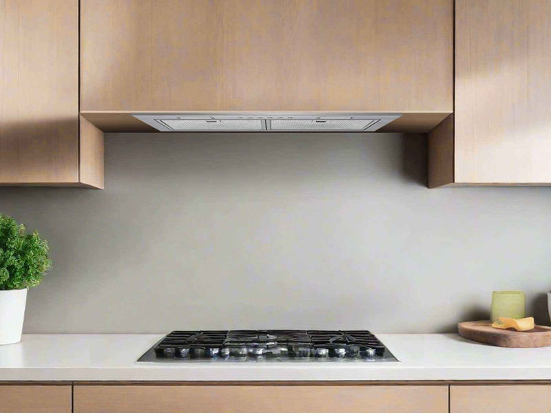 Installed 21 Inch 600 CFM Range Hood Insert Victory Q6 flush inside 12 inch cabinets, showing perfect fit and alignment