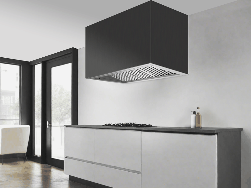 Modern kitchen with 48 inch range hood insert installed inside black custom cabinetry above a cooktop