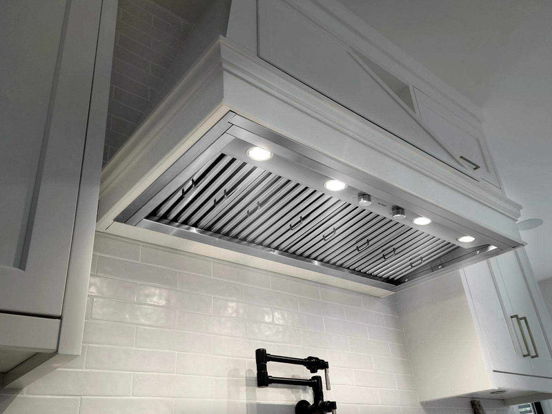 Built-in range hood showing dimmable LED lights and durable mechanical rotary knobs for precise airflow control
