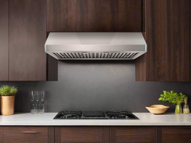 30 Inch 900 CFM Victory Verona under-cabinet range hood installed beneath dark wood cabinets, seamlessly fitting over a professional gas cooktop